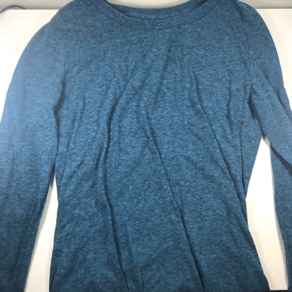 This is a plain blue long sleeve shirt.